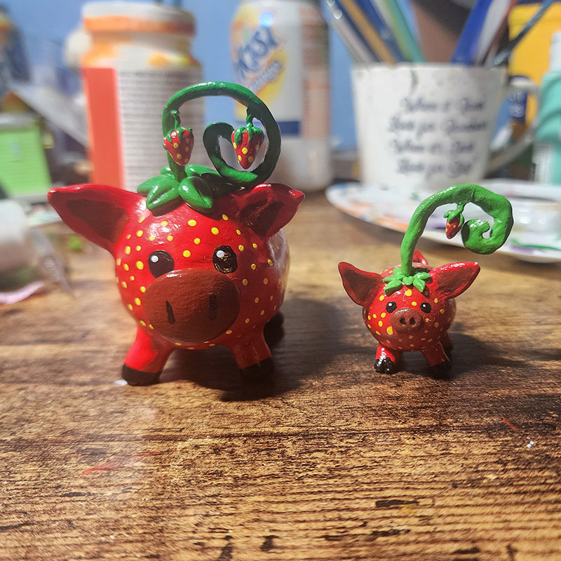 Two Strawberry Pigs