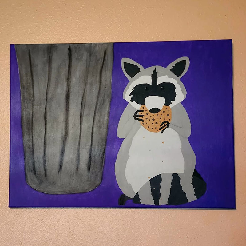 Raccoon Eating a Cookie
